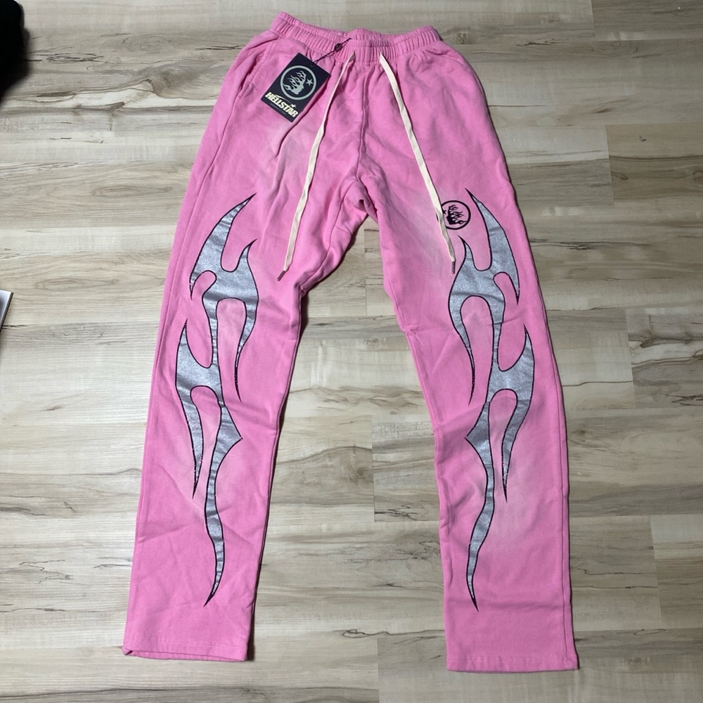 Pink Hellstar sweatpants with silver flame